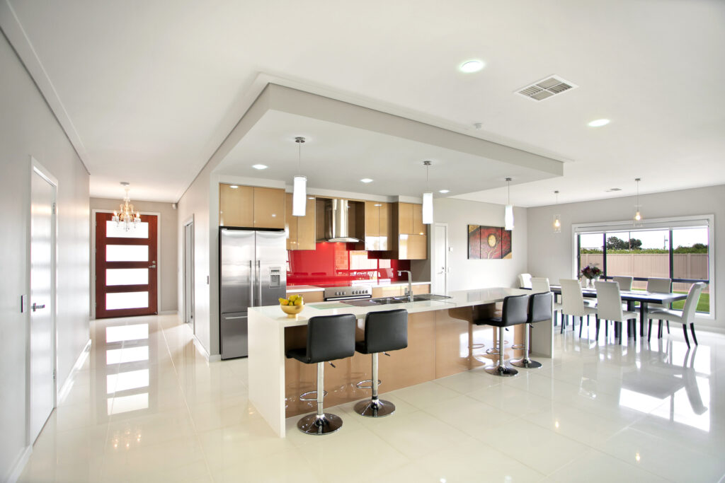 Photo of a kitchen and front door for real estate.